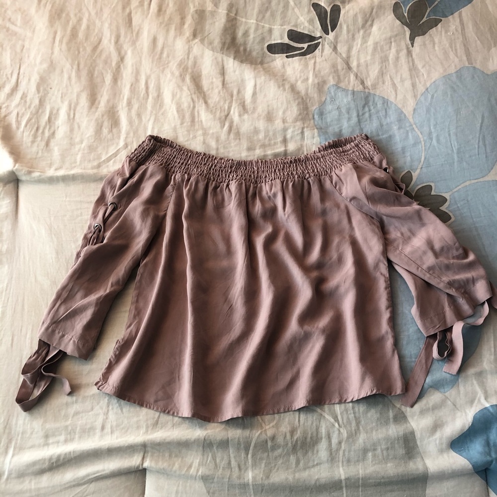 Off the shoulder shirt with ties on the arms